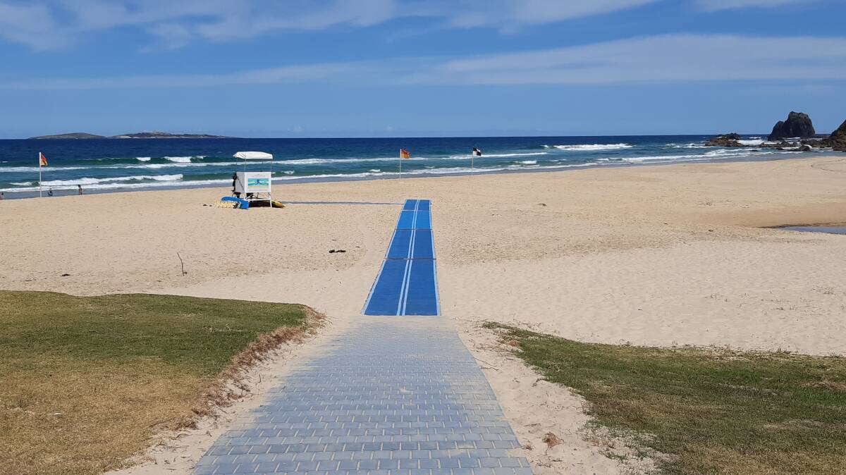 The new mobility mats, which roll out and peg into the sand, will be packed up ahead of storms or large seas. Photo supplied.
