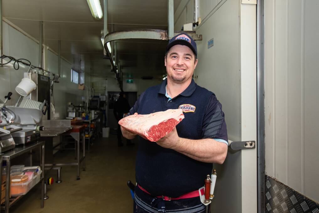 Josh "Pezza" Perry back at home in his butcher shop at Smithton. Picture by Eve Woodhouse.