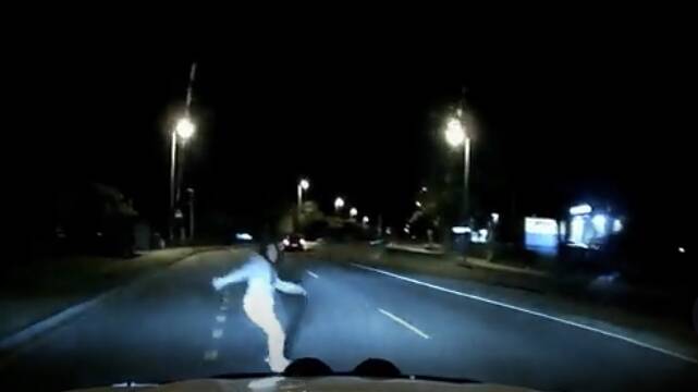 A still from dashcam footage shows the woman running onto the road. Picture via Dashcam Australia