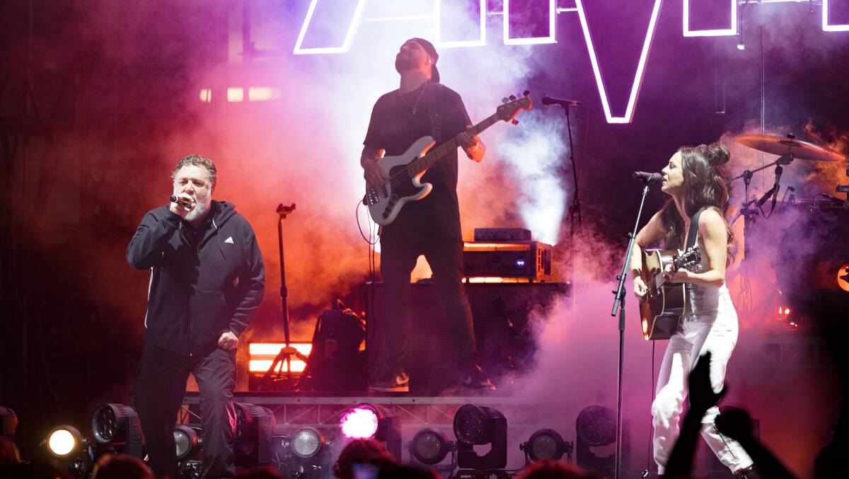 Actor Russell Crowe and singer Amy Shark at the recent Groovin the Moo music festival. Jobs in entertainment are among those most at risk as the economy slows, say economists. Picture by Sitthixay Ditthavong