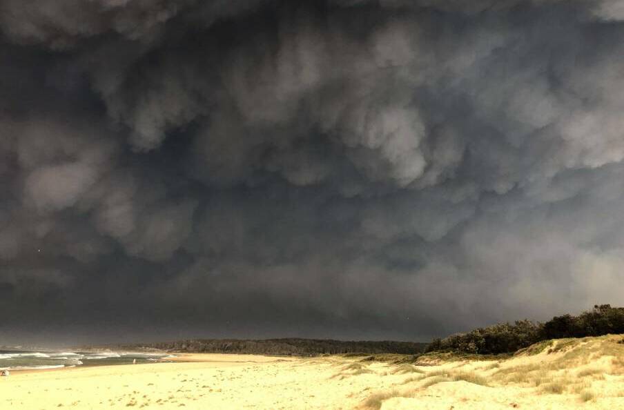 Smoke billowed over One Tree Beach in Tuross Head on December 31, 2019. Picture file