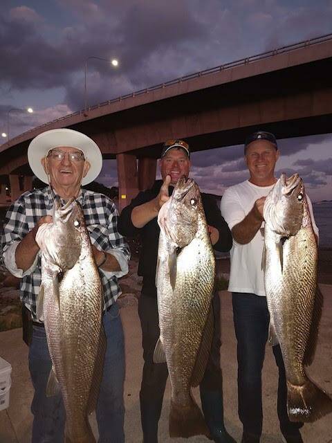 Locals Ross Britt, Jewie Josh and James Bunn with their recent daytime jewfish haul in Batemans Bay.