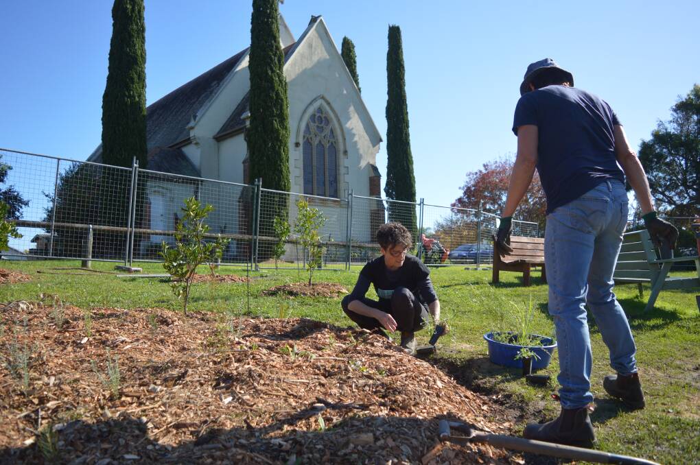 The Climate Factory's founder Edwina Robinson and Robyn Ellwood continued planting out the garden beds on May 16.