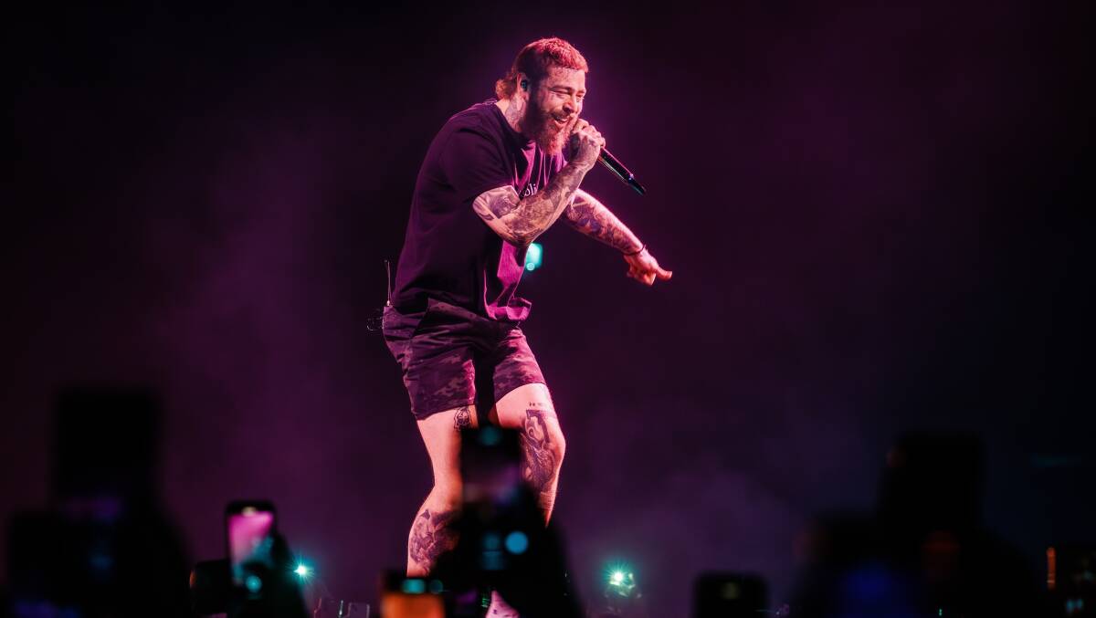 Post Malone, pictured performing in May, will be coming to Canberra on November 25. Picture by Shutterstock