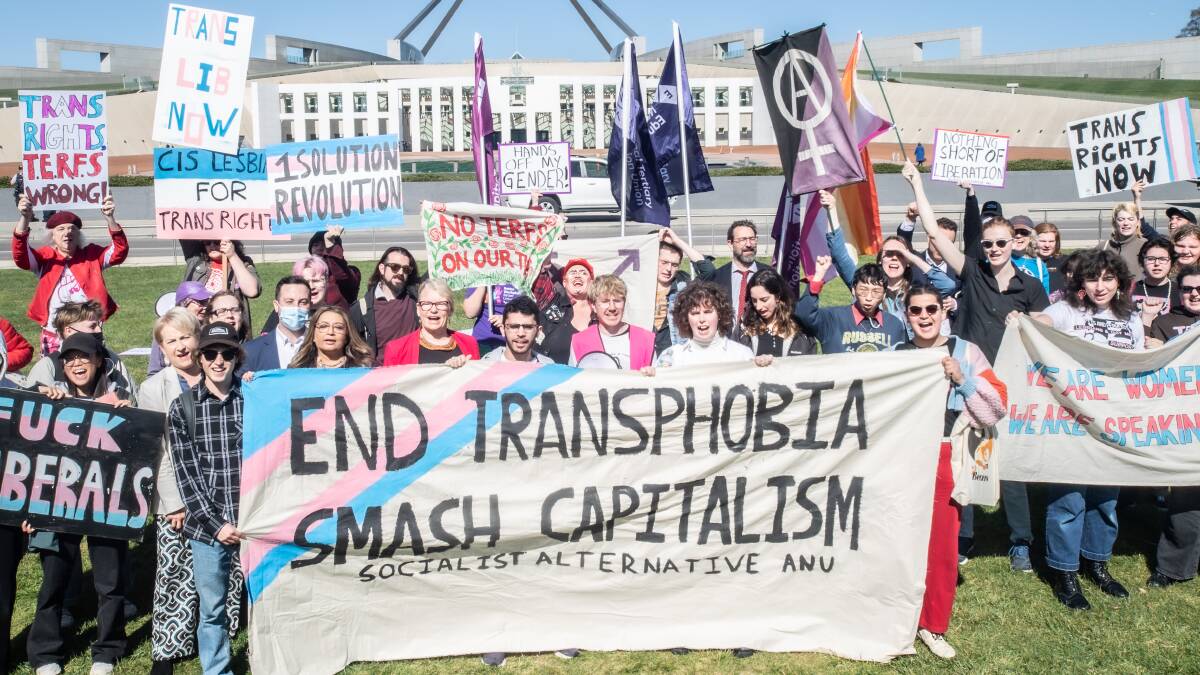 Trans rights activists held a rally outside of parliament. Picture by Karleen Minney.