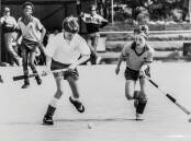 Scott Salkeld from United takes on Brock Biilman from the ACT in the Australian Schools Hockey Championships at Lyneham.