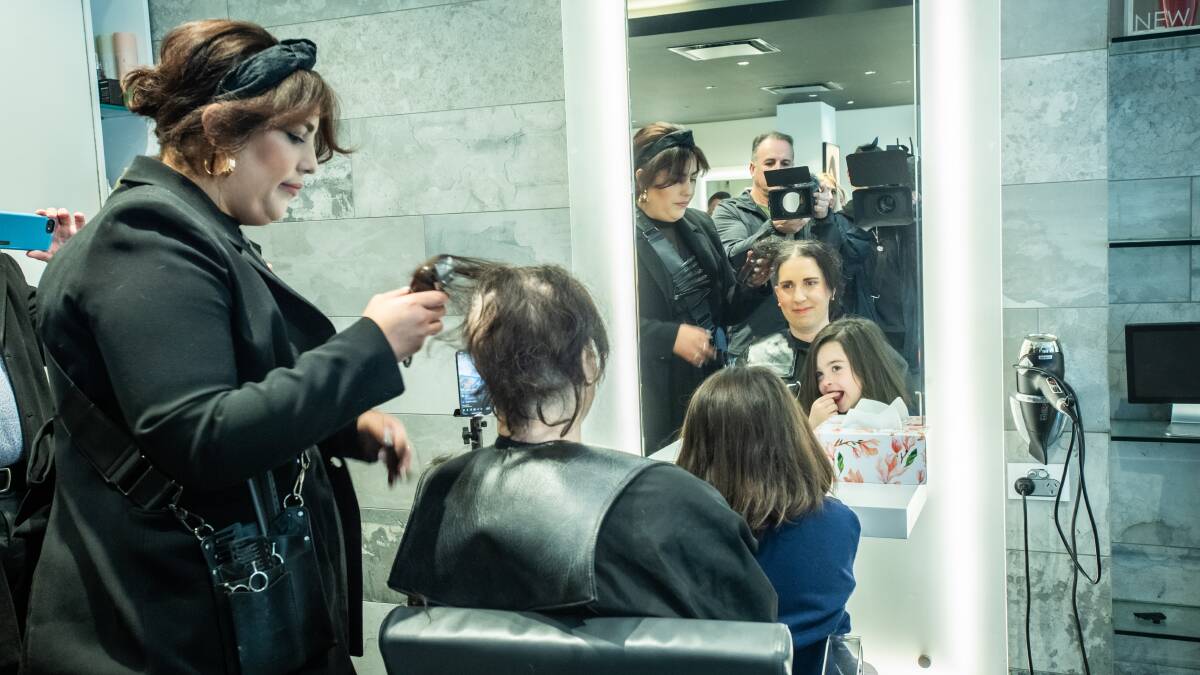 Breast cancer survivor and stylist Claudia Cataldo did the honours. Picture by Karleen Minney