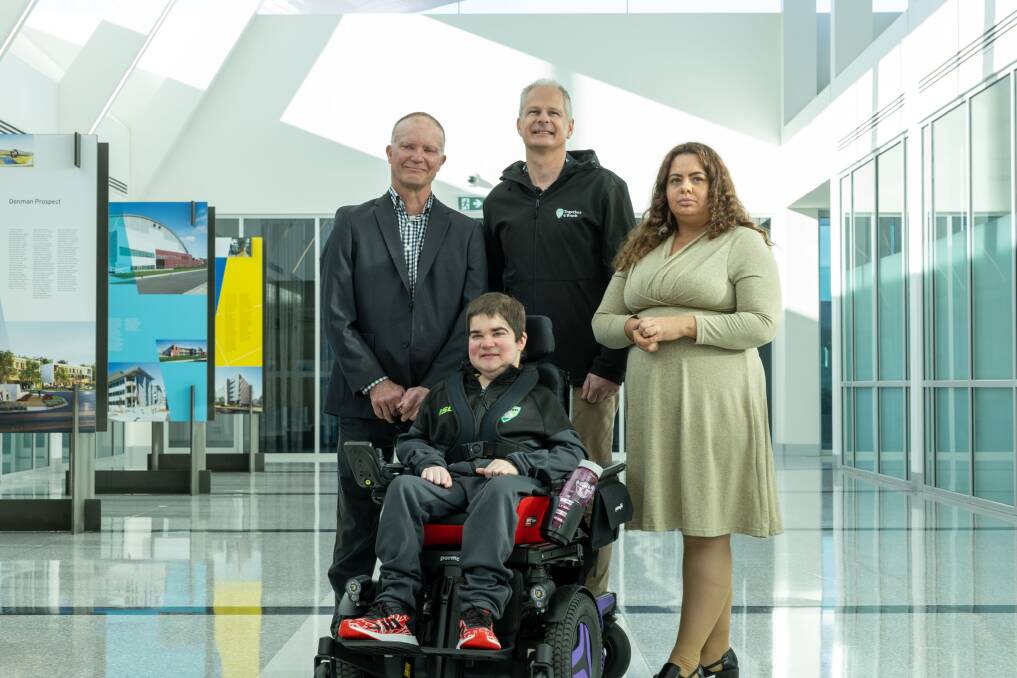 Capital Region Muscular Dystrophy secretary Rob Oakley, Together4Youth chief executive officer Andrew Turvey, Mental Health Mob founder Kristen Franks and (front) Power Chair Football League player Brandan Stroud at yesterday's grants announcement. Picture by Gary Ramage