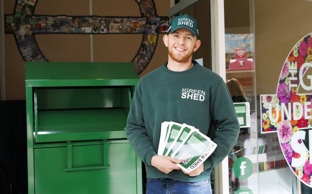 Tom Bigg-Withers is re-opening The Green Shed Underground and placing these green collection bins around the city for donations of clothing, shoes and accessories. Picture by Keegan Carroll
