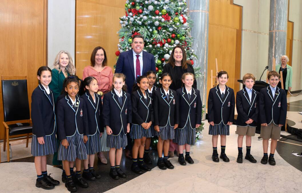 The Canberra Grammar School choir performed at the launch of the Christmas Giving Tree. Picture by Sitthixay Ditthavong