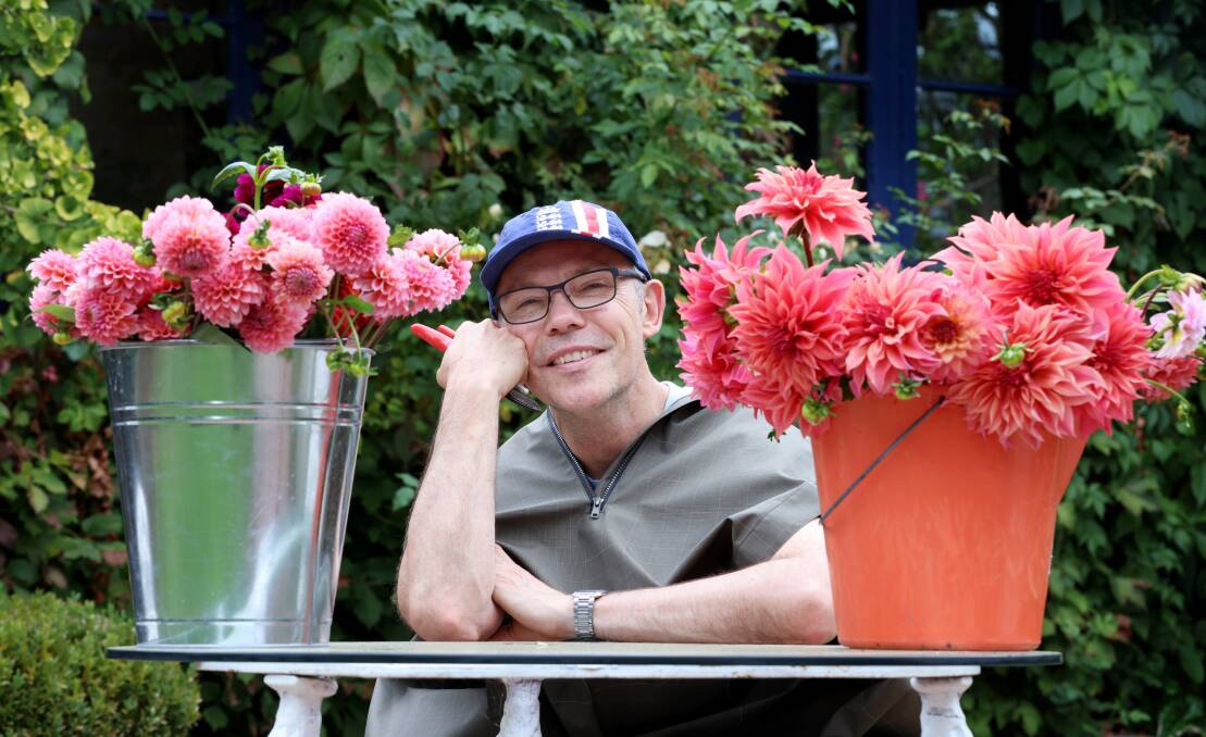 Bison Glasshouse owner Brian Tunks is celebrating the dahlia, Pialligo and community at The Plot at Pialligo this weekend. Picture by James Croucher