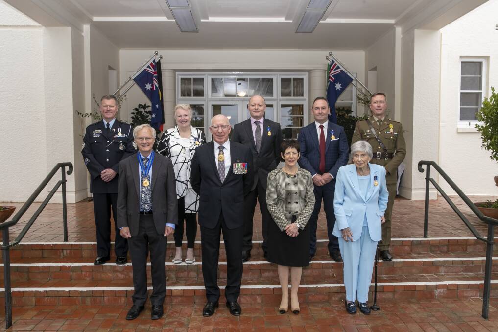 Governor-General David Hurley and wife Linda (front, centre) last Wednesday at Government House with award recipients (from left) Sergeant Gregory Corin, Emeritus Professor James Williams, Roxanne Missingham, Dr David O'Rourke, Ricky Stuart, Dawn Waterhouse and Major Benjamin McCaskill. Picture: Keegan Carroll