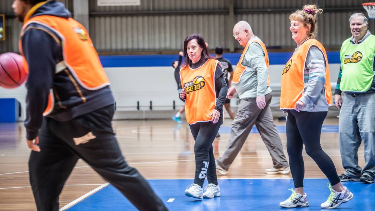 Walking and smiling at walking basketball are (l-r) Pauline Godber, 63, David Blanch, 68, Jenni Philippa,59, and Peter Kinnell, 79. Picture by Karleen Minney 