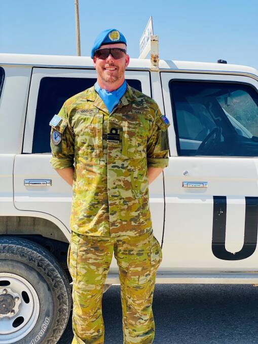 Canberra dad Lieutenant Commander Travis Robinson will be spending Father's Day deployed on Operation Paladin in Lebanon. Picture supplied 