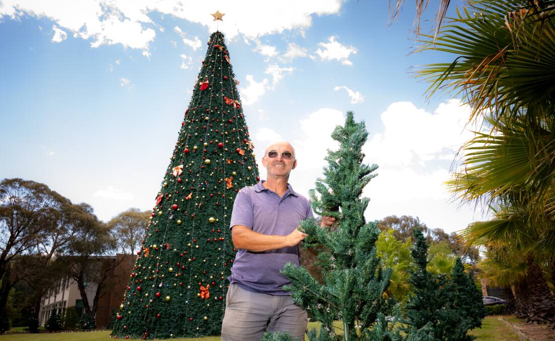 Amaroo's Robert Azdajic at the Christmas Park in Farrer he created for charity. Pictures by Elesa Kurtz