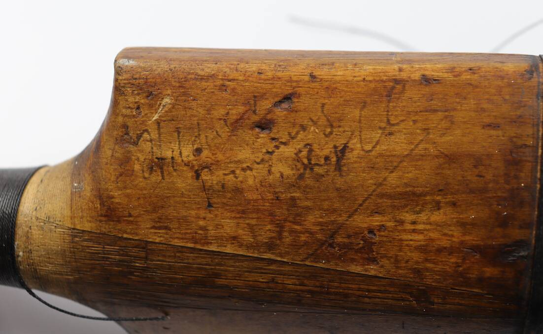 The bat has the GHS Trott signature on it and the date 1888. Picture by Sarah May