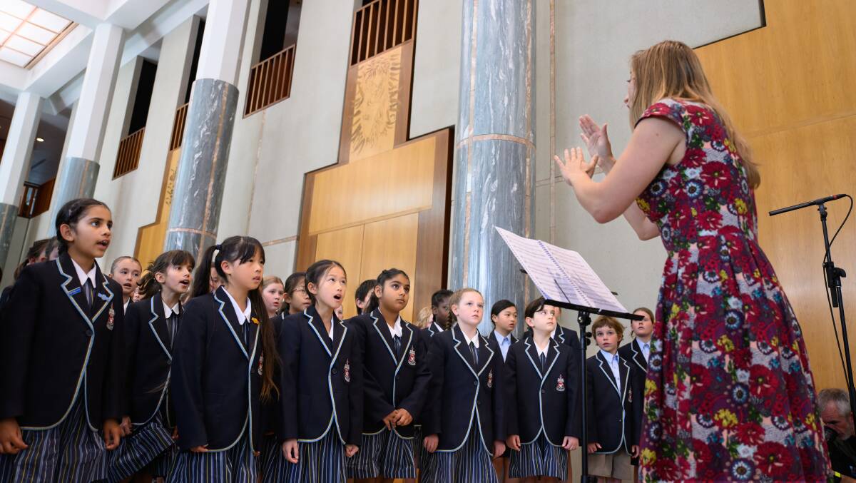The Canberra Grammar School choir is led by teacher Claire Halse. Picture by Sitthixay Ditthavong