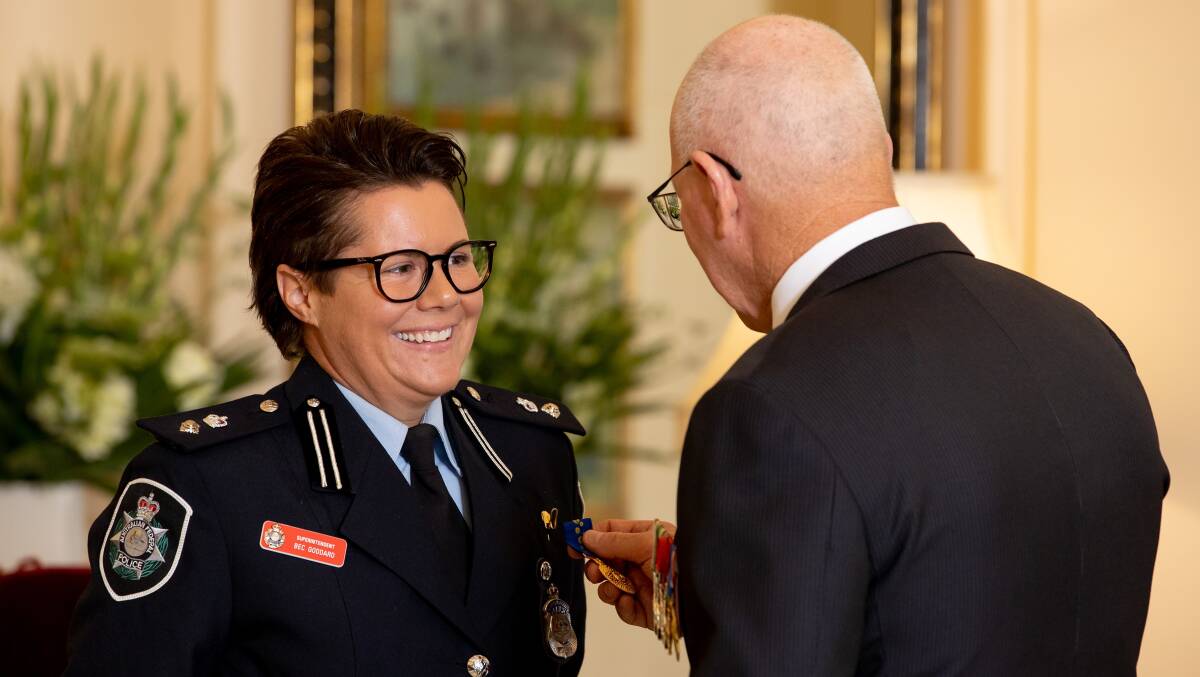 Bec Goddard is awarded her Order of Australia medal by Governor-General David Hurley last week. Picture: John Solomon