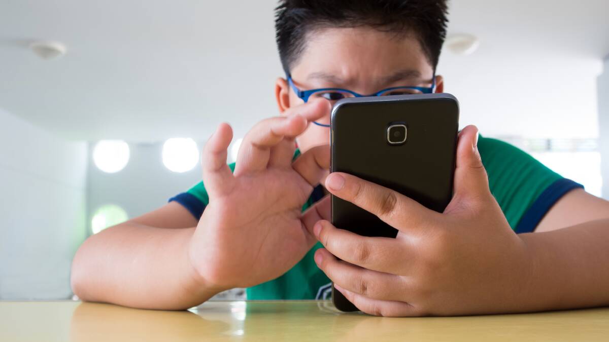 Primary and high school students can learn manage to get through the school day without checking their phones. Picture by Shutterstock