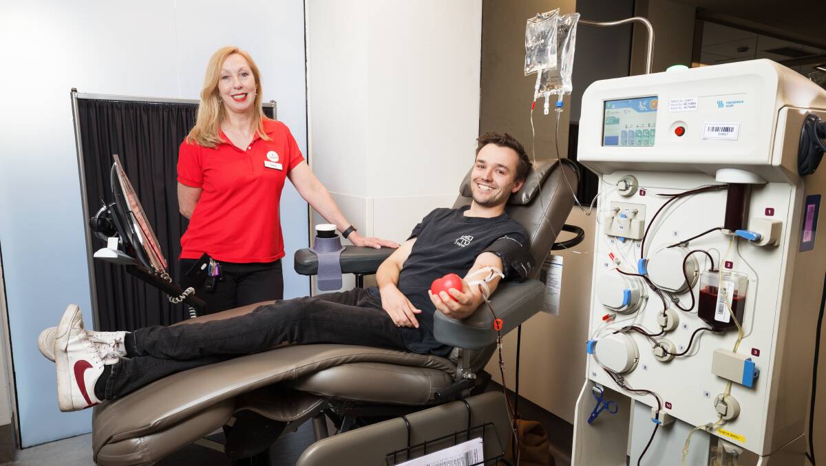 Lifeblood's Sally Deveson and plasma donor Mitchell Blythe. Picture by Sitthixay Ditthavong.