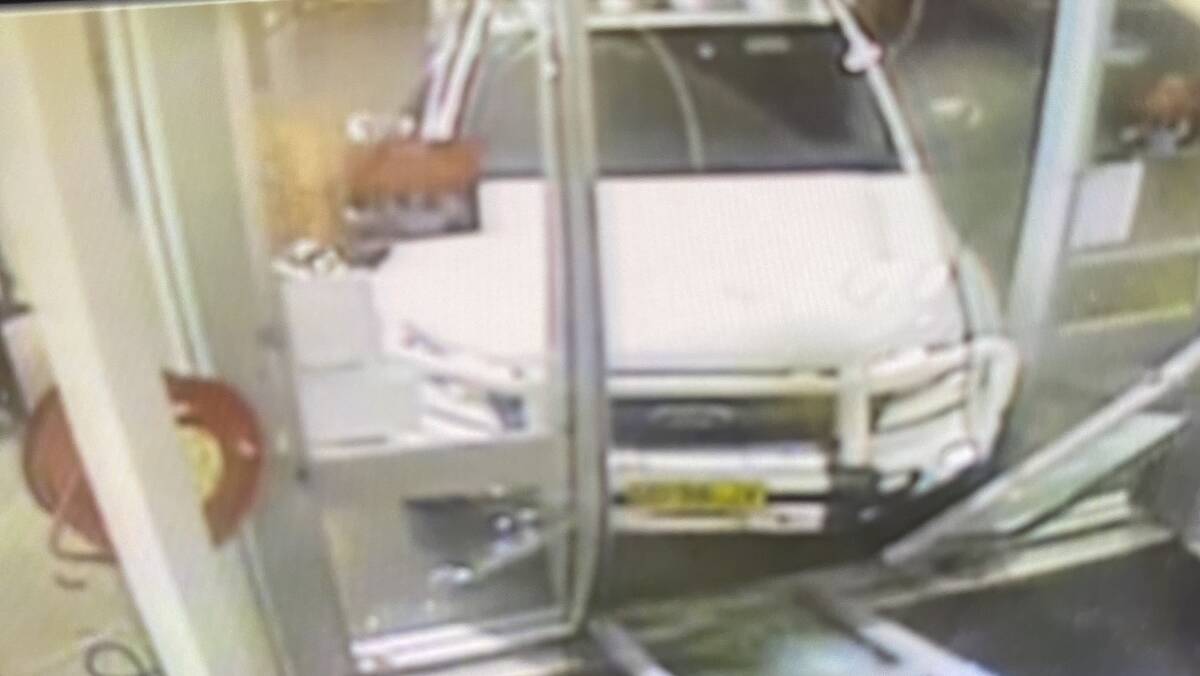 Image of a white Ford Ranger that was driven into Coles at Chisholm. Picture supplied
