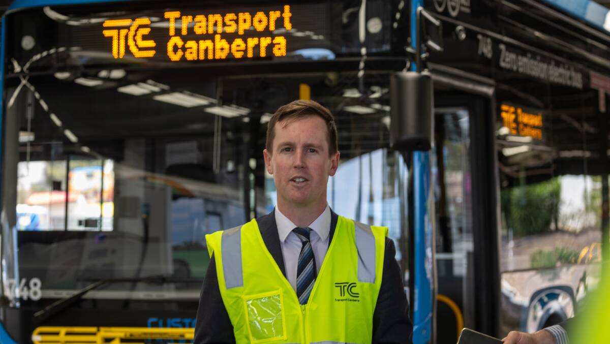 Transport Minister Chris Steel with the new Custom Denning bus at the Belconnen Bus Depot on Monday. Picture by Gary Ramage