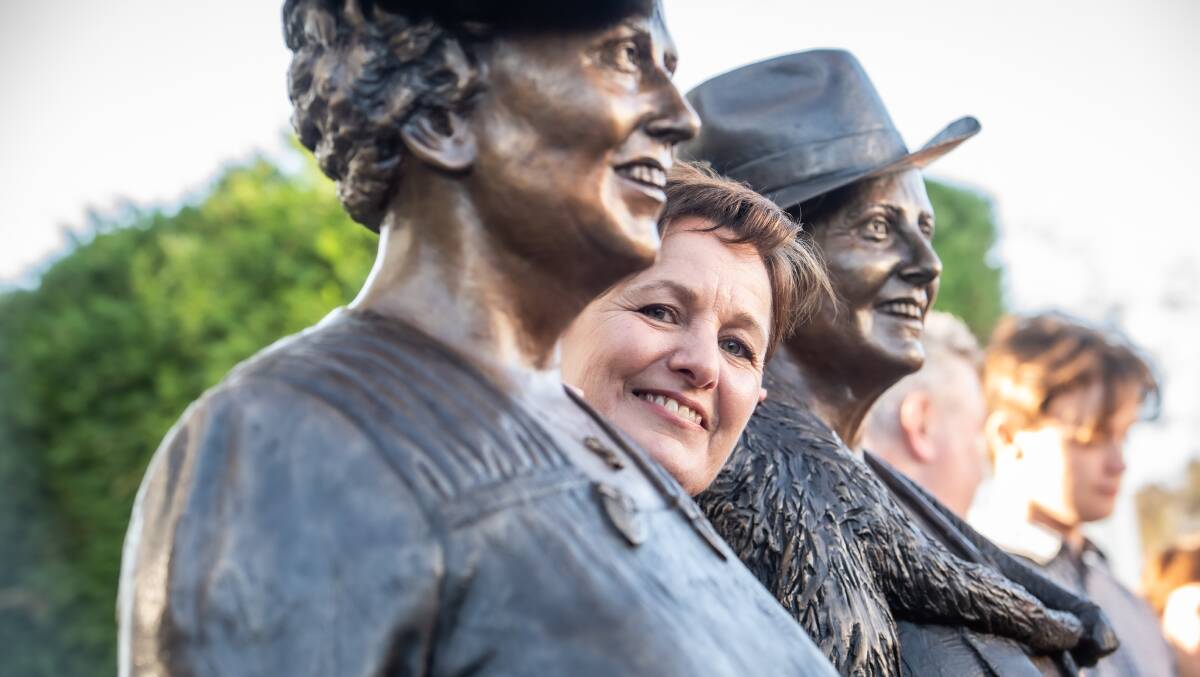 Lis Johnson with her statues of Dame Dorothy Tangney and Dame Enid Lyons, when they were unveiled in Canberra on International Women's Day 2023. Picture by Karleen Minney