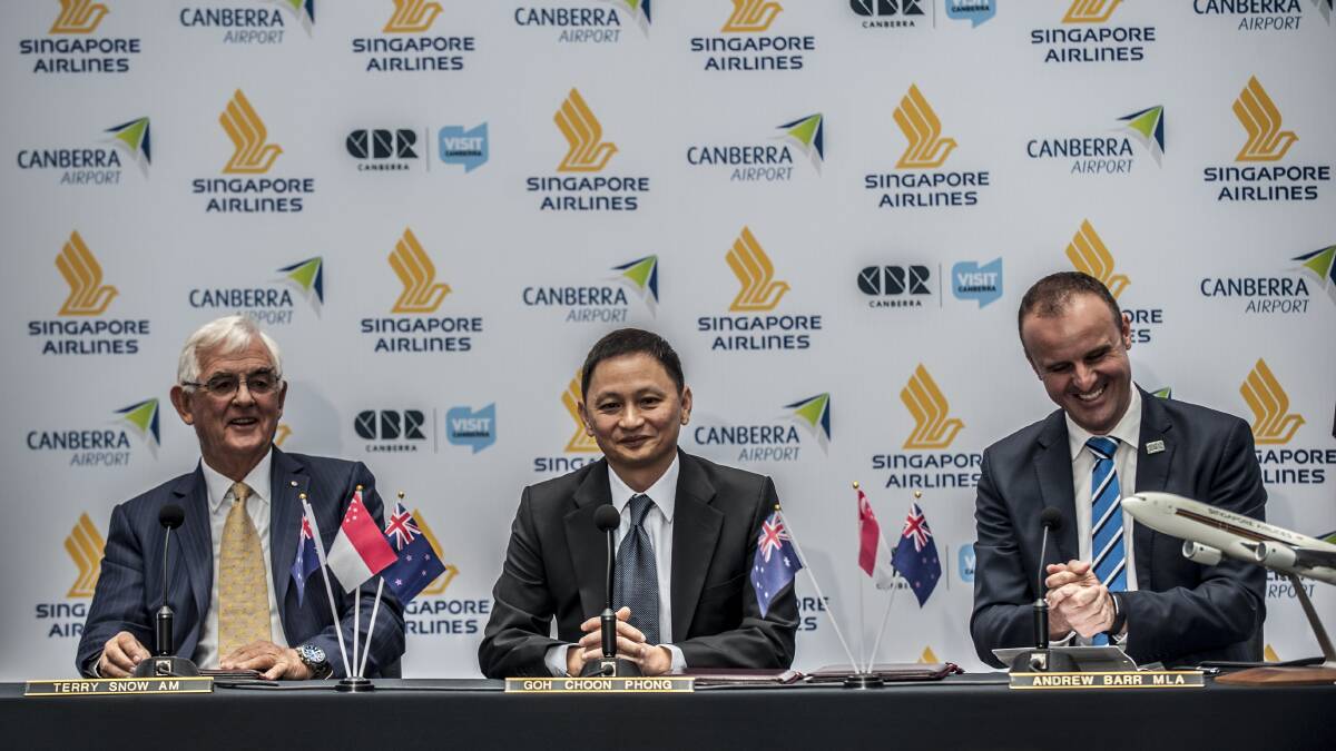 Canberra Airport owner Terry Snow, Singapore Airlines chief executive Goh Choon Phong and Chief Minister Andrew Barr at a January 2016 announcement of direct Singapore Airlines flights to Canberra. Photo by Karleen Minney