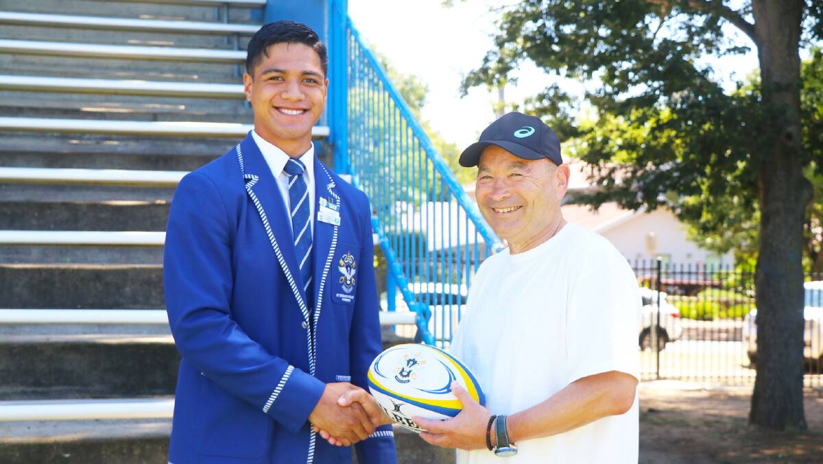 This St Edmunds College student was content to shake the hand of new Wallabies head coach Eddie Jones. Another told him he'd one day play Test rugby under him. Picture Supplied