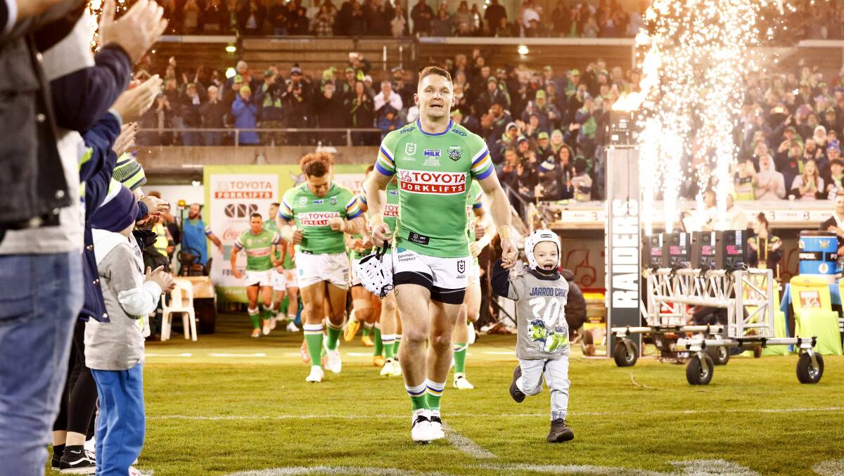 Canberra captain Jarrod Croker ran out to a rousing reception for his 300th game. Pictures by Keegan Carroll