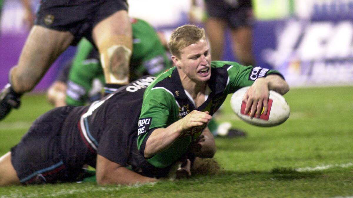 Brett Finch scores for the Raiders during a finals win over Penrith in 2000. Picture by Kym Smith