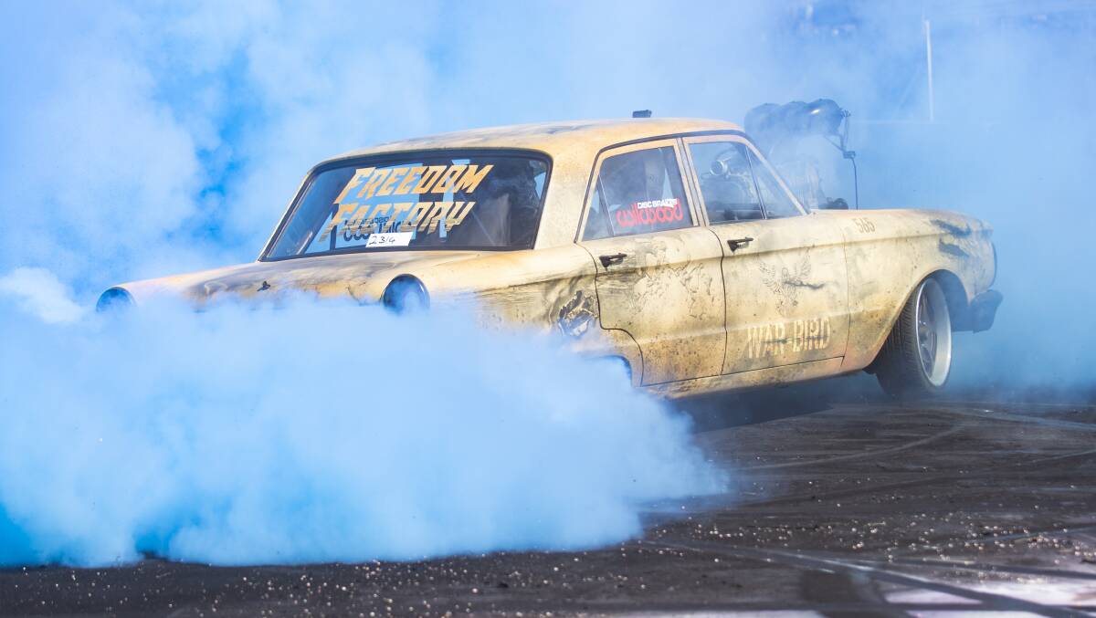 A driver performs a burnout during the show the victim was watching when struck. Picture: Keegan Carroll