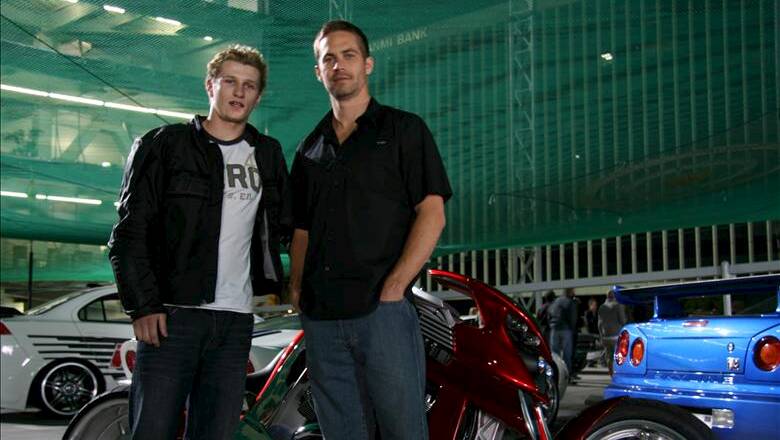 Rhys Kember, left, with deceased Fast & Furious star Paul Walker. Picture StarNow