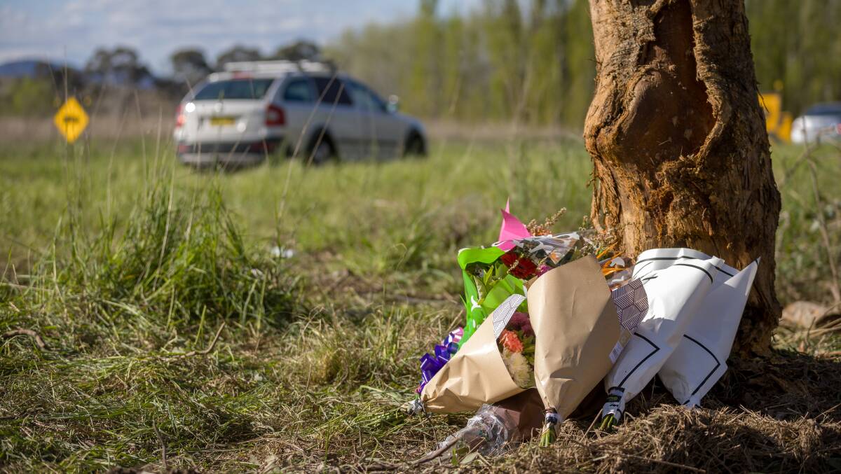 Flowers left at the scene of the fatal crash in October 2022. Picture by Sitthixay Ditthavong