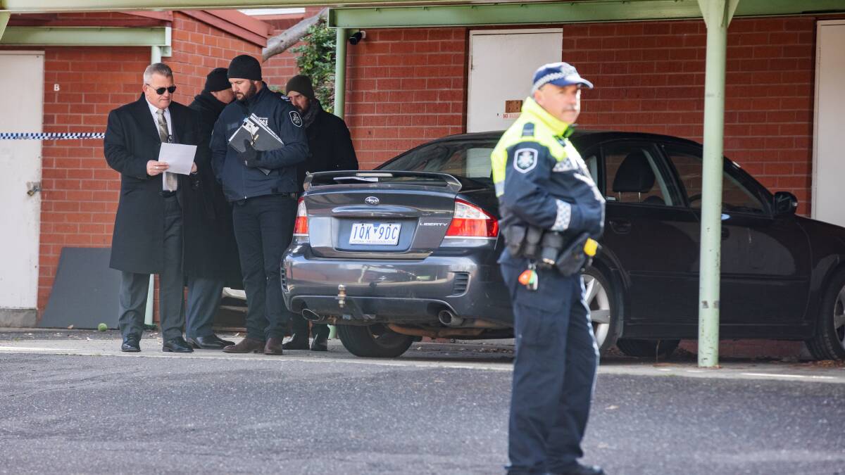 Police at the scene in Phillip after Glenn Walewicz was murdered. Picture by Sitthixay Ditthavong