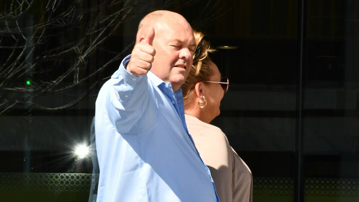 John Nocen gives a thumbs-up outside court on Thursday. Picture by Tim Piccione