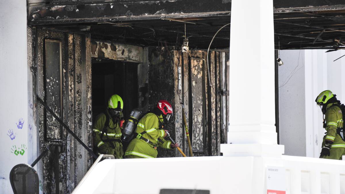 Firefighters at the scene after the blaze. Picture: by Dion Georgopoulos