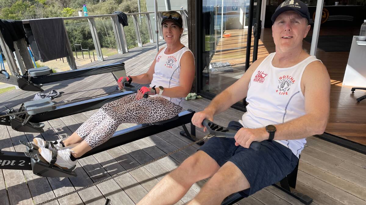 Pambula Surf Life Saving Club members Kirsty and Simon Byrne take part in the weekend's 24-hour row for mental health. Picture by Ben Smyth