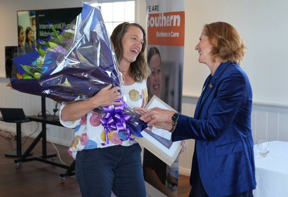 Southern Midwife of the Year 2023 Hannah Bird is congratulated by SNSWLHD board chair Elizabeth Hoskins. Picture supplied