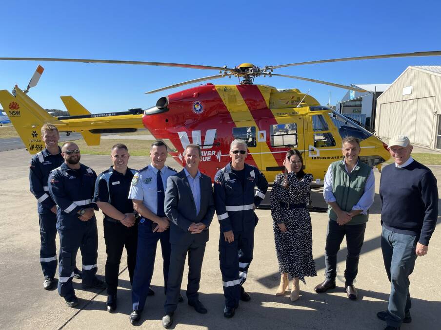 UPGRADED CHOPPER: Representatives from SLSA, South Coast Police, Westpac and Member for Bega Andrew Constance unveil the chopper. 