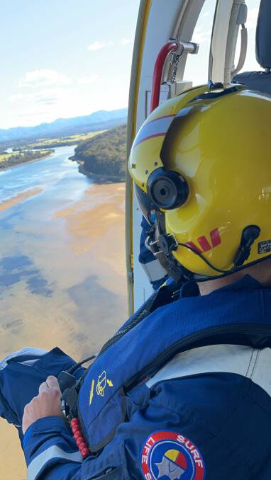 Air crew officer Brad Nagy checks out the Moruya River. 