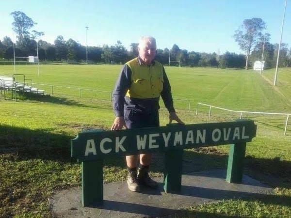 TRIBUTE: The late Ack Weyman stands at the oval he built. A statue of Ack and his son Mick will be unveiled at the oval before a memorial match on Satuday. 