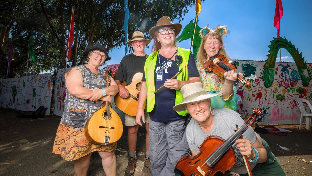 National Folk Festival former director Heidi Pritchard, centre, with musicians Jane Harding from Campbells Creek, Mike Cosgriff from Beeac, Lyndal Thorburn from Queanbeyan, and Maxine Ross from Uralla ahead of the 2024 festival. Picture by Sitthixay Ditthavong