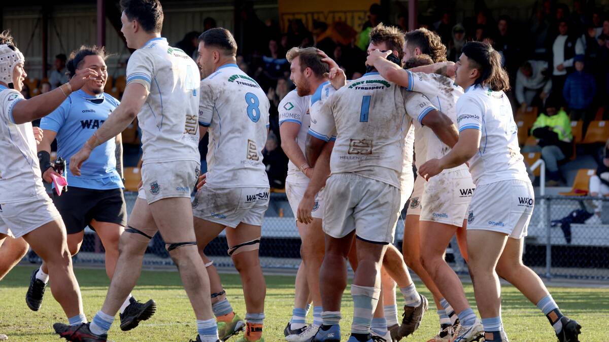 The Queanbeyan Whites celebrate one of their tries at Viking Park. Picture by James Croucher