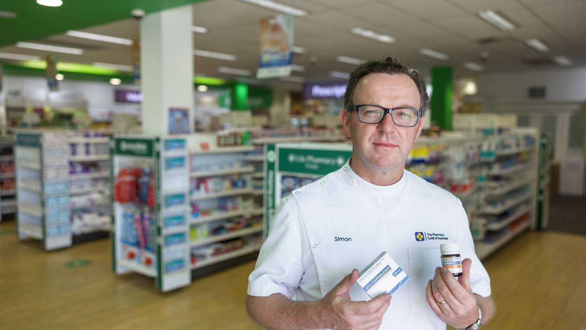 Pharmacy Guild ACT branch president Simon Blacker with products used to treat UTIs. Picture by Sitthixay Ditthavong 