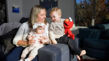 Sarah Dunbar with her children Maddie, 4 months, and Hamish, 2, who were conceived via IVF. Picture by Sitthixay Ditthavong