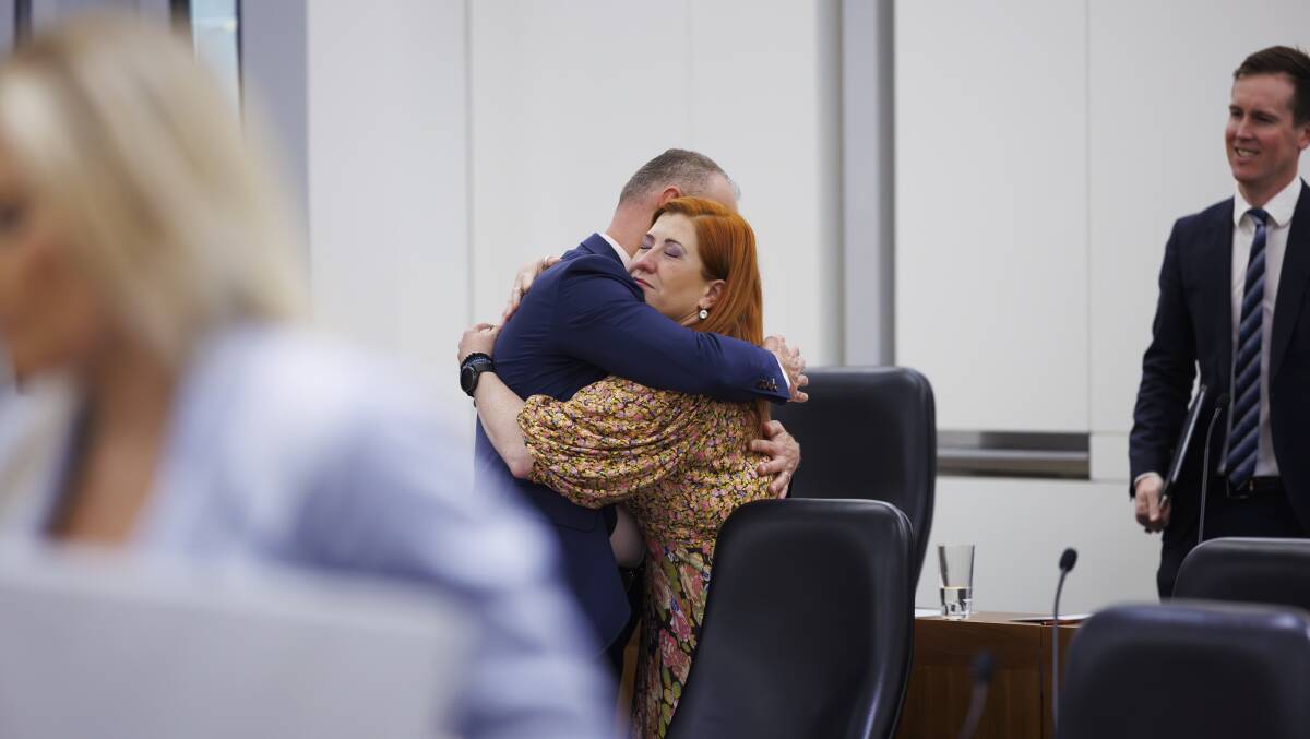 Chief Minister Andrew Barr and Human Rights Minister Tara Cheyne hugging after the voluntary assisted dying bill passed the Assembly. Picture by Keegan Carroll 