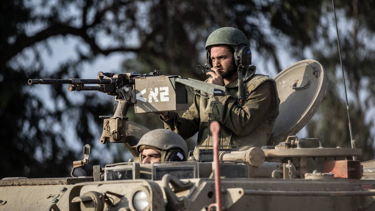 Israeli forces establish heavily armed control points along the border. Picture Getty Images