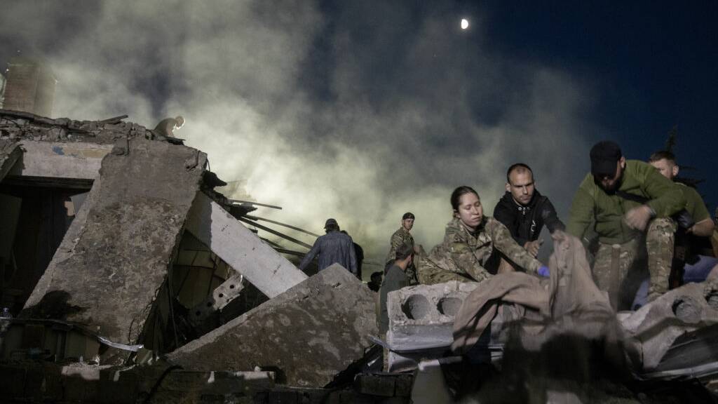 Rescue teams work to find survivors after a Russian missile attack hits Kramatorsk in Ukraine. Picture Getty Images