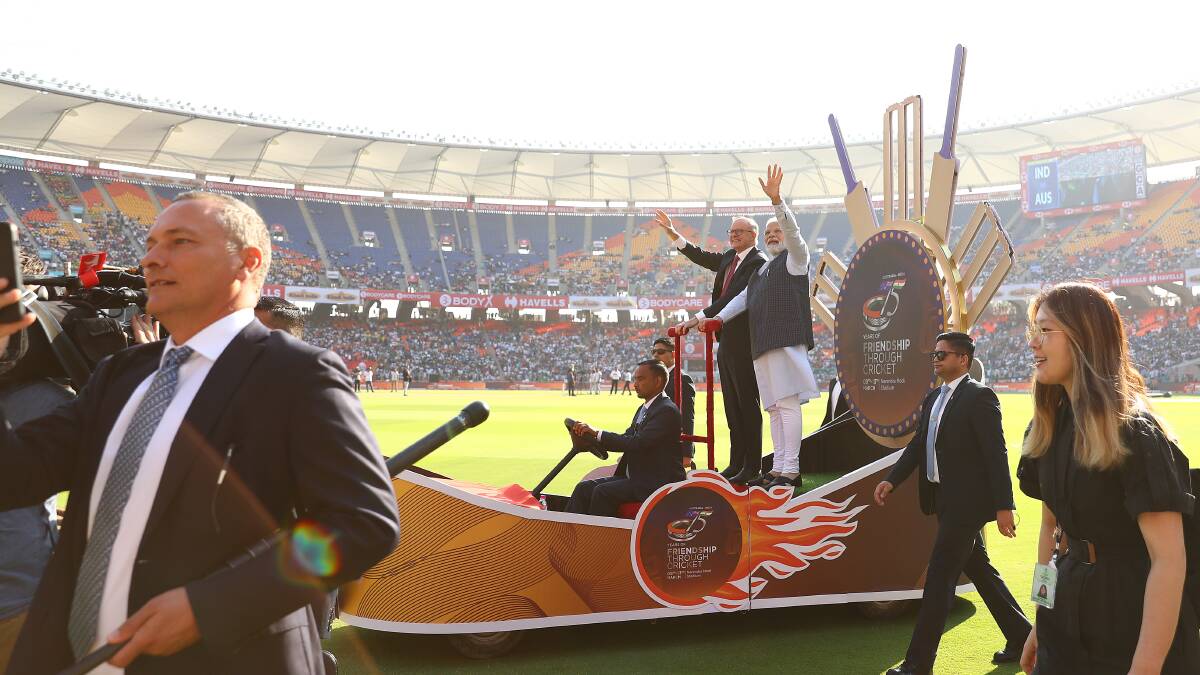 Anthony Albanese and Indian Prime Minister Narendra Modi on a lap of honour at the cricket in Ahmedabad on Thursday. Picture Getty Images